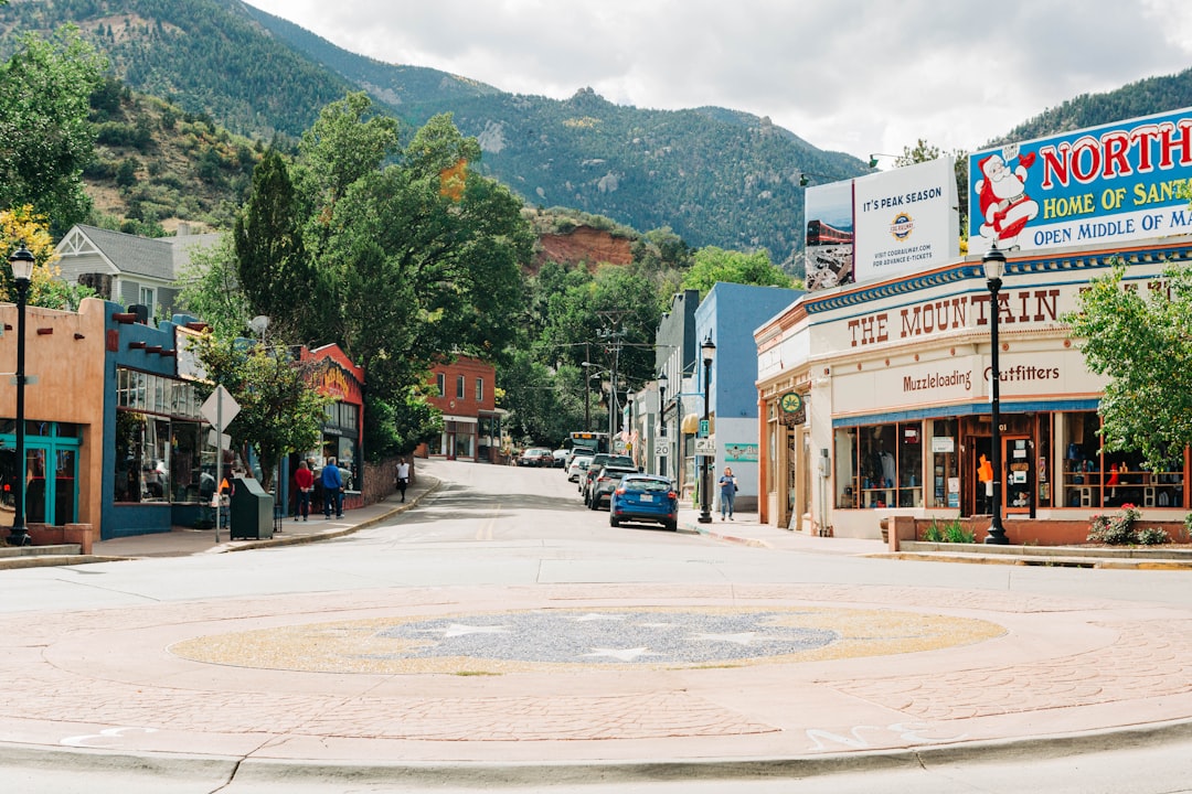 Colorful storefronts and shops along the main street of Manitou Springs, Colorado