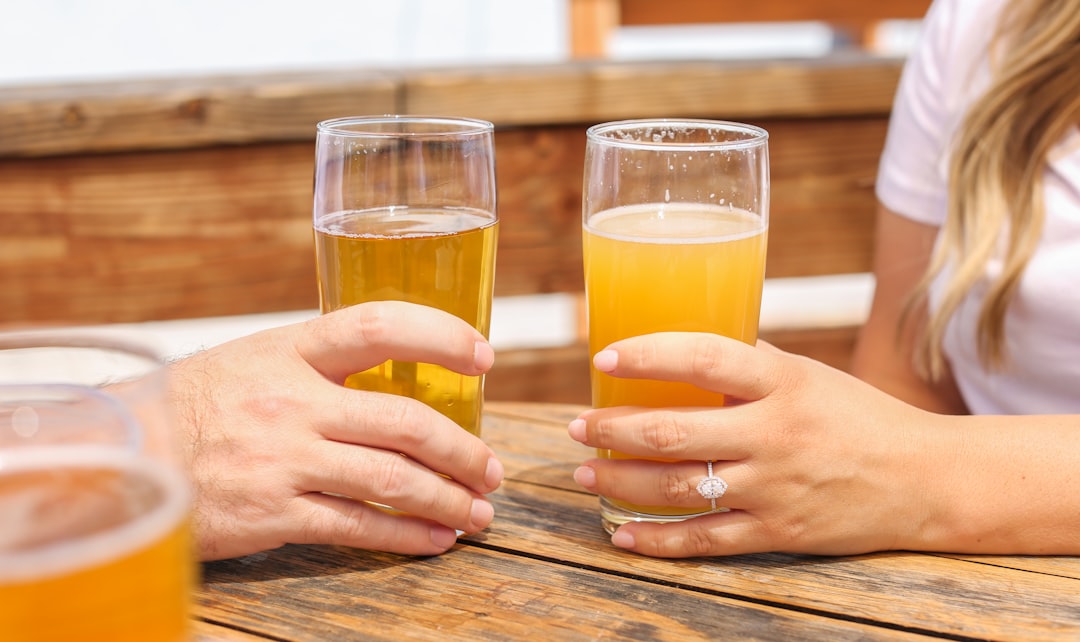 flight of different craft beers on a wooden table