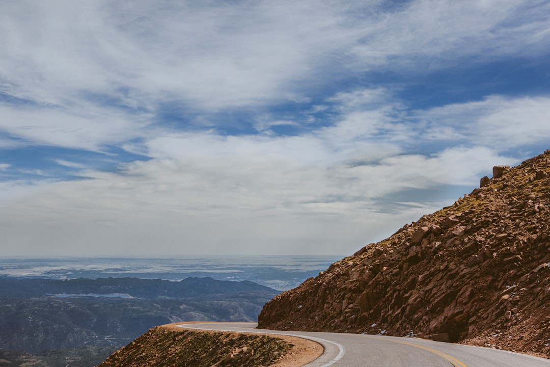 winding mountain road of Pikes Peak Highway in Colorado