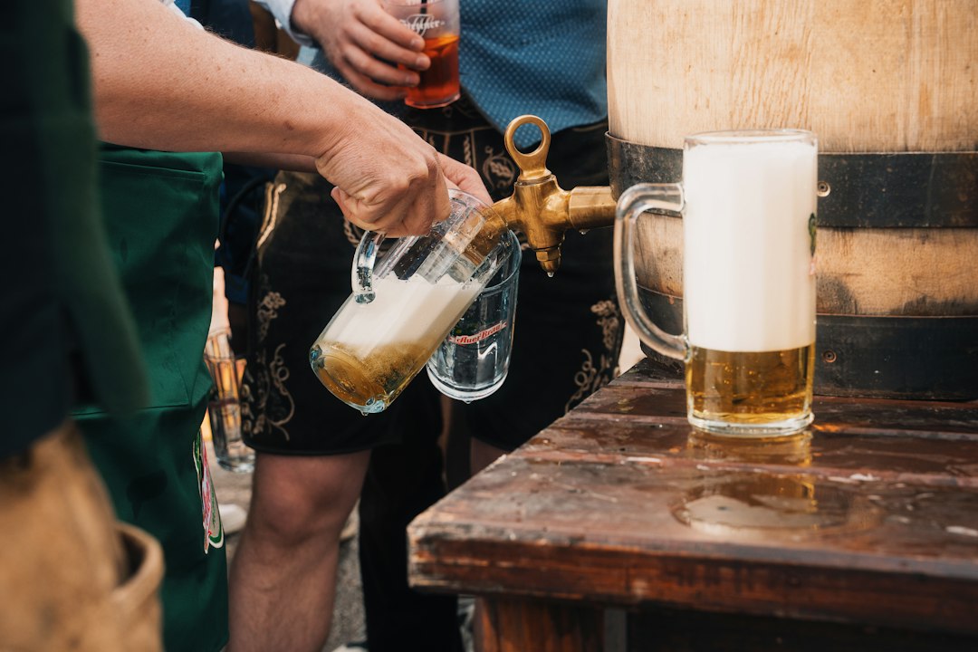 a lively craft brewery beer garden with people enjoying drinks