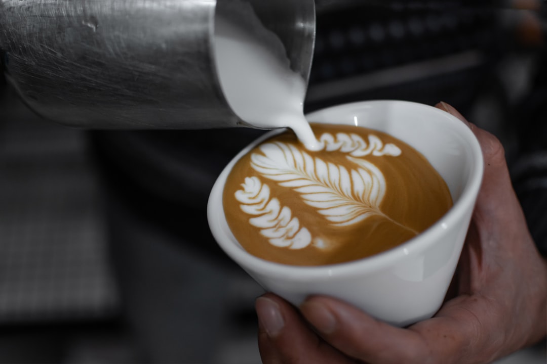 artisanal latte art in a cozy, independent coffee shop