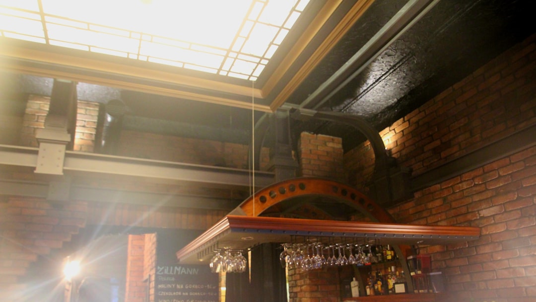 flight of craft beer sitting on a wooden bar at a brewery
