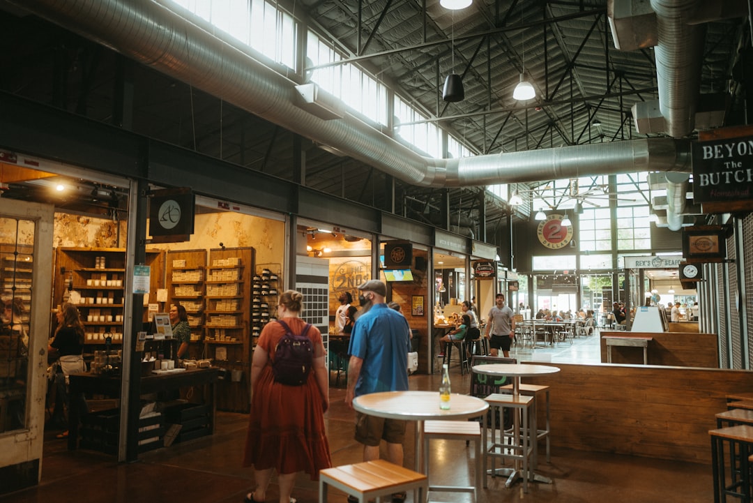 interior of a cozy, modern craft brewery with people enjoying drinks