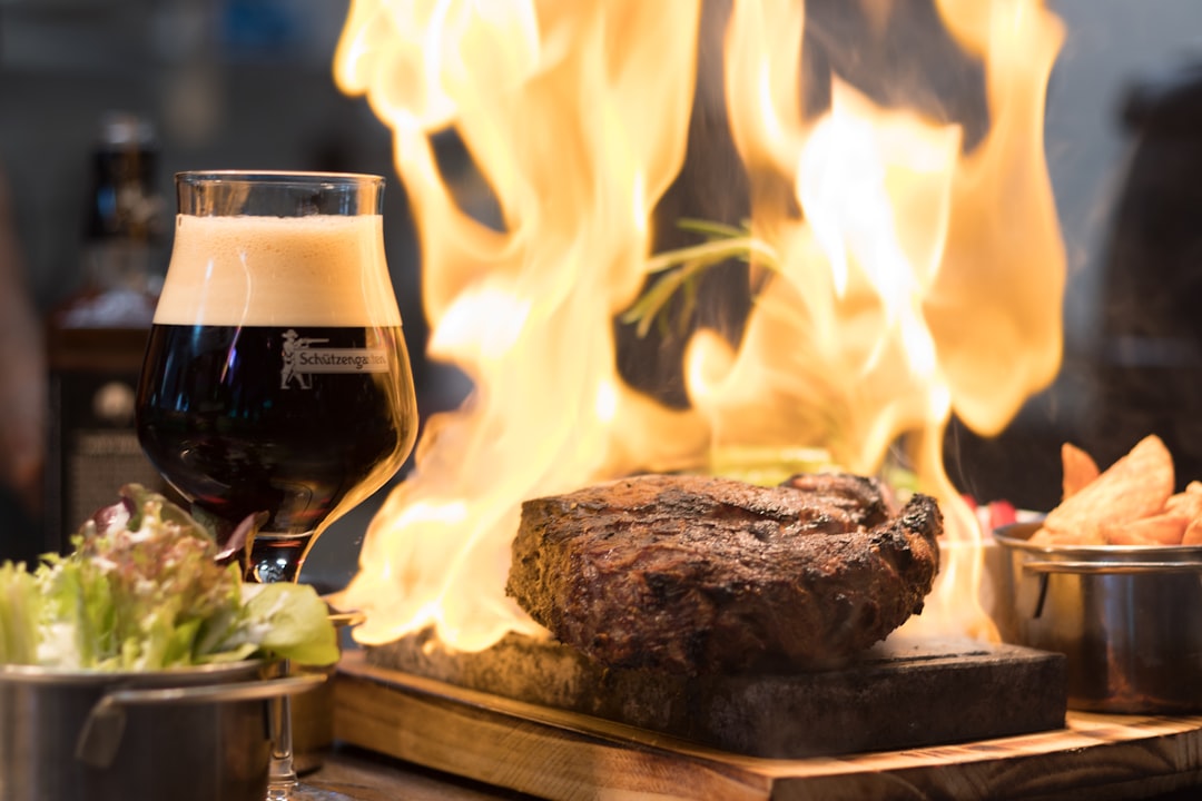 modern gourmet burger and craft beer on a wooden table