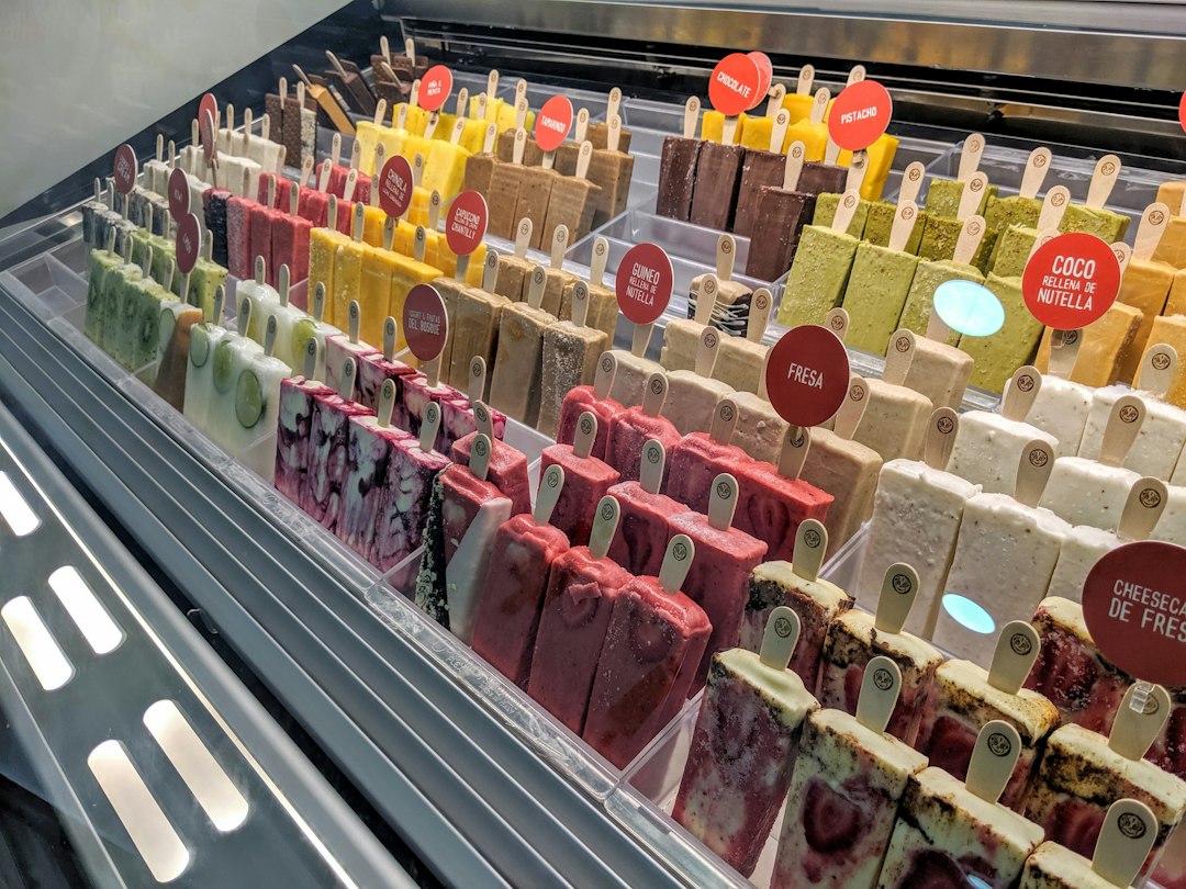 vibrant gourmet ice pops in a display case