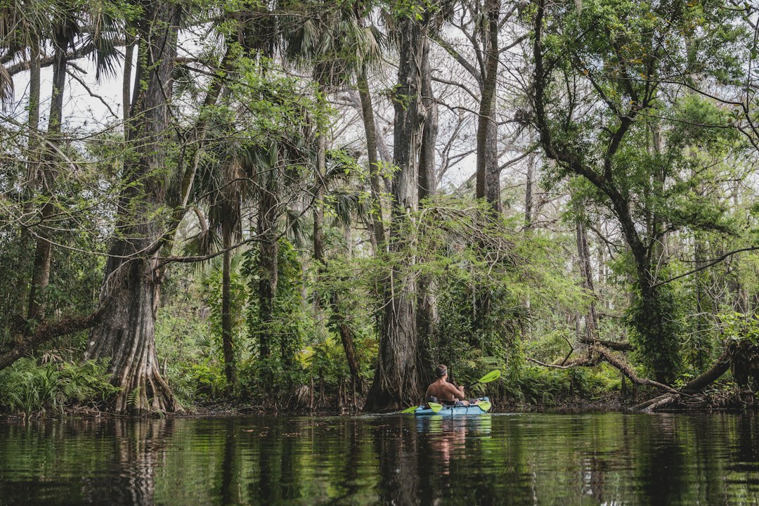 kayaker on crystal-clear spring-fed river in Florida