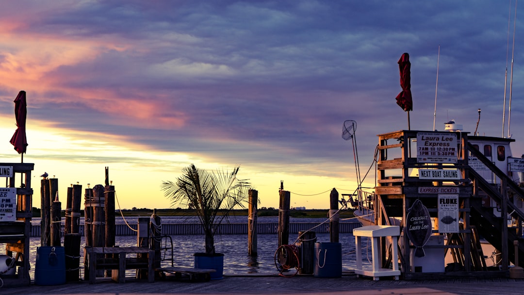 colorful Pier Park storefronts at sunset