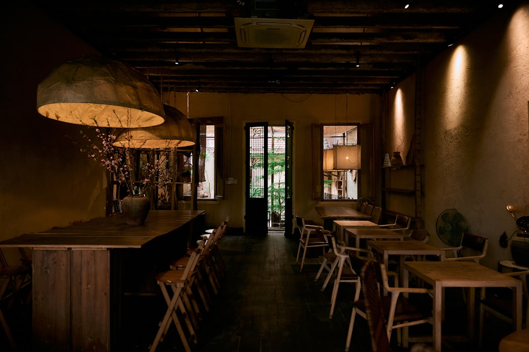 cozy and rustic restaurant interior with warm lighting at night
