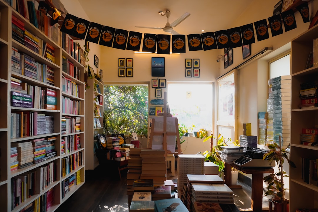 cozy independent bookstore interior with packed shelves and a reading nook
