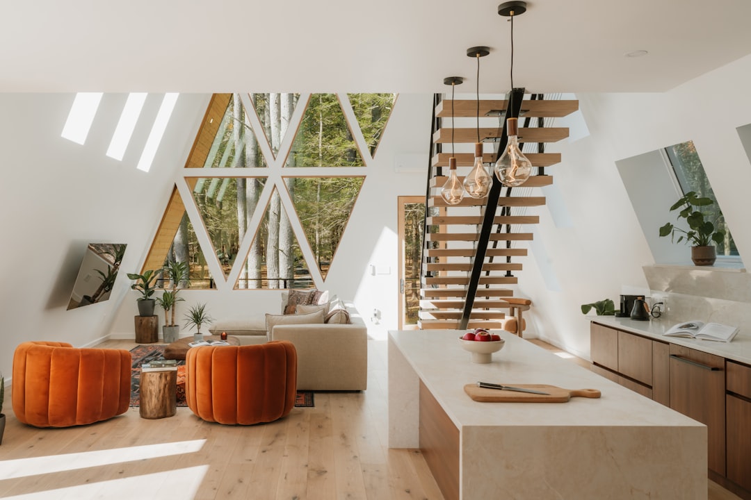 professional cleaner sanitizing a modern kitchen in a vacation rental