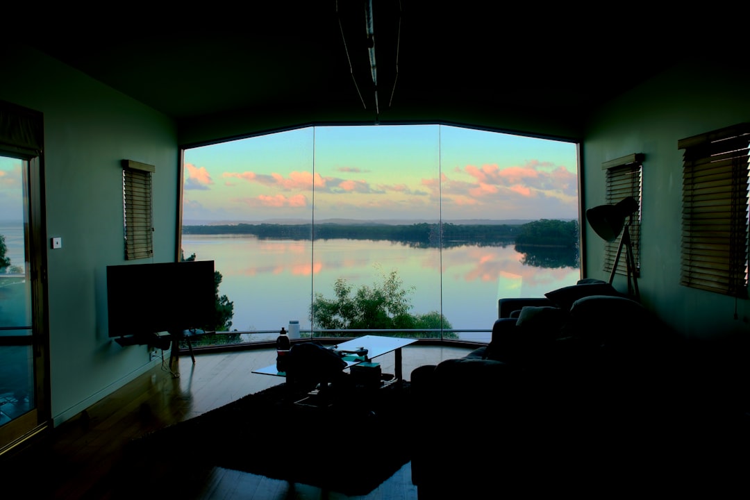 professional photographer taking pictures of a vacation rental living room