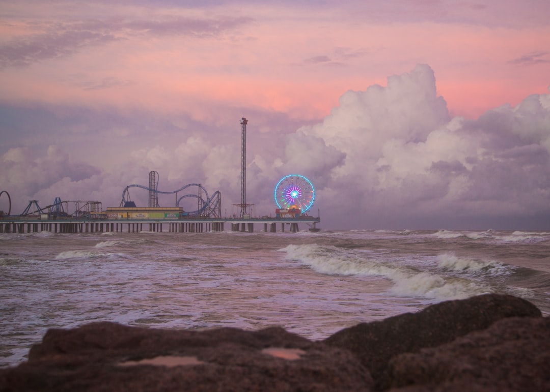 colorful Pier Park storefronts at sunset