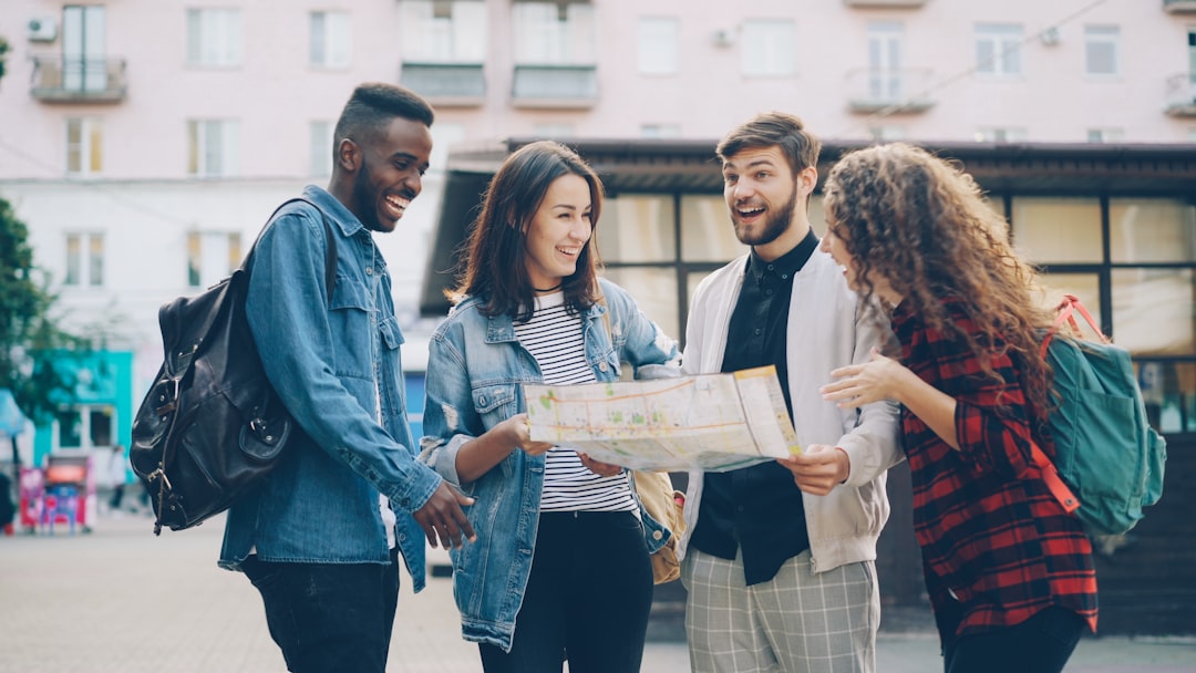 group of friends looking at a map together