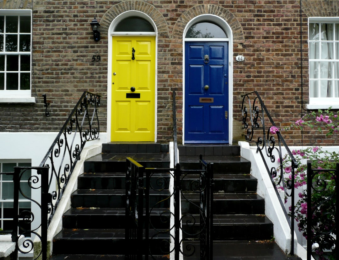 suitcases packed and ready by a front door